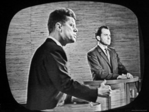John Kennedy and Richard Nixon compete in the first televised debate.